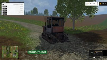 Старый гусеничный трактор для фермы